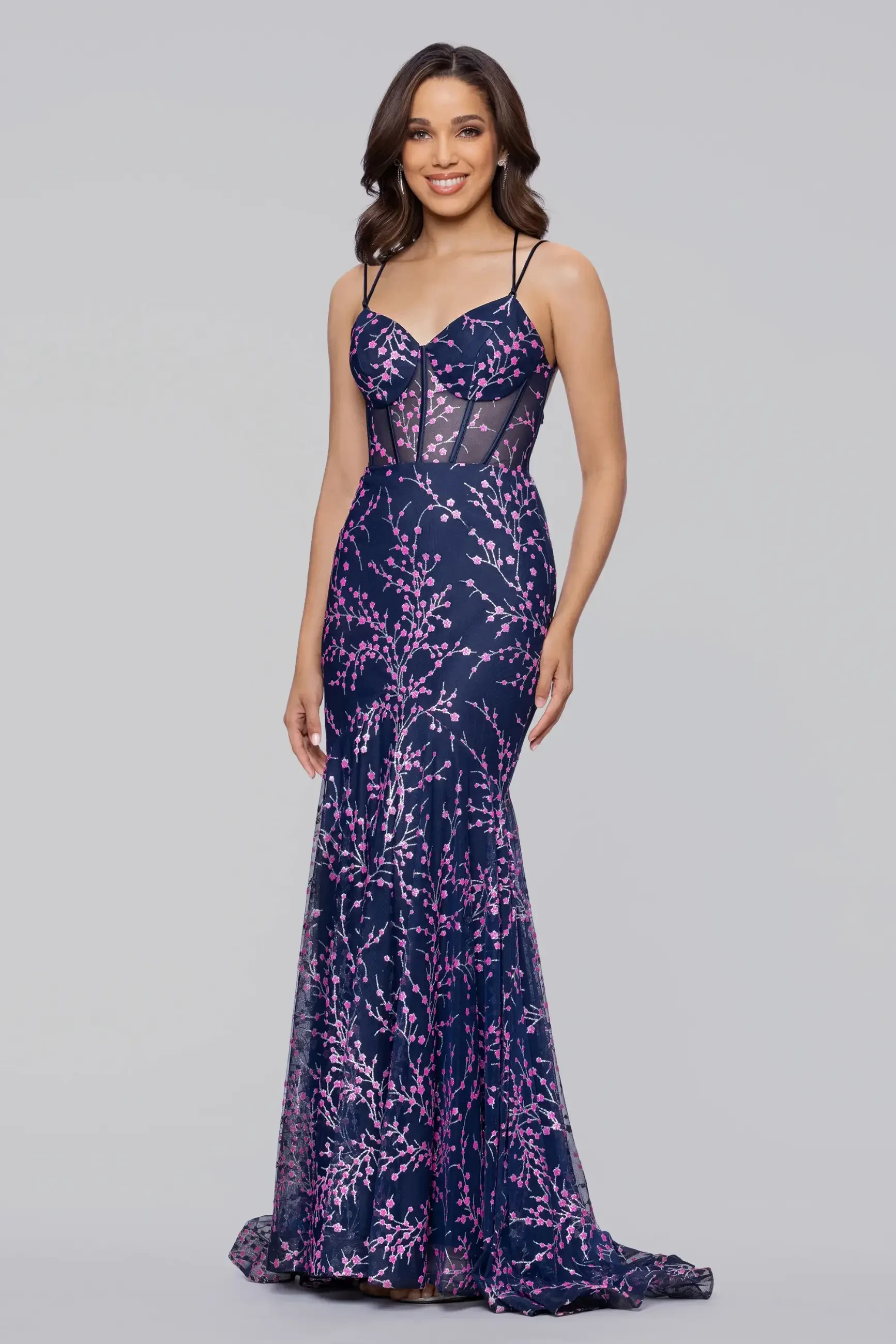 model is wearing a sleeveless purple dress