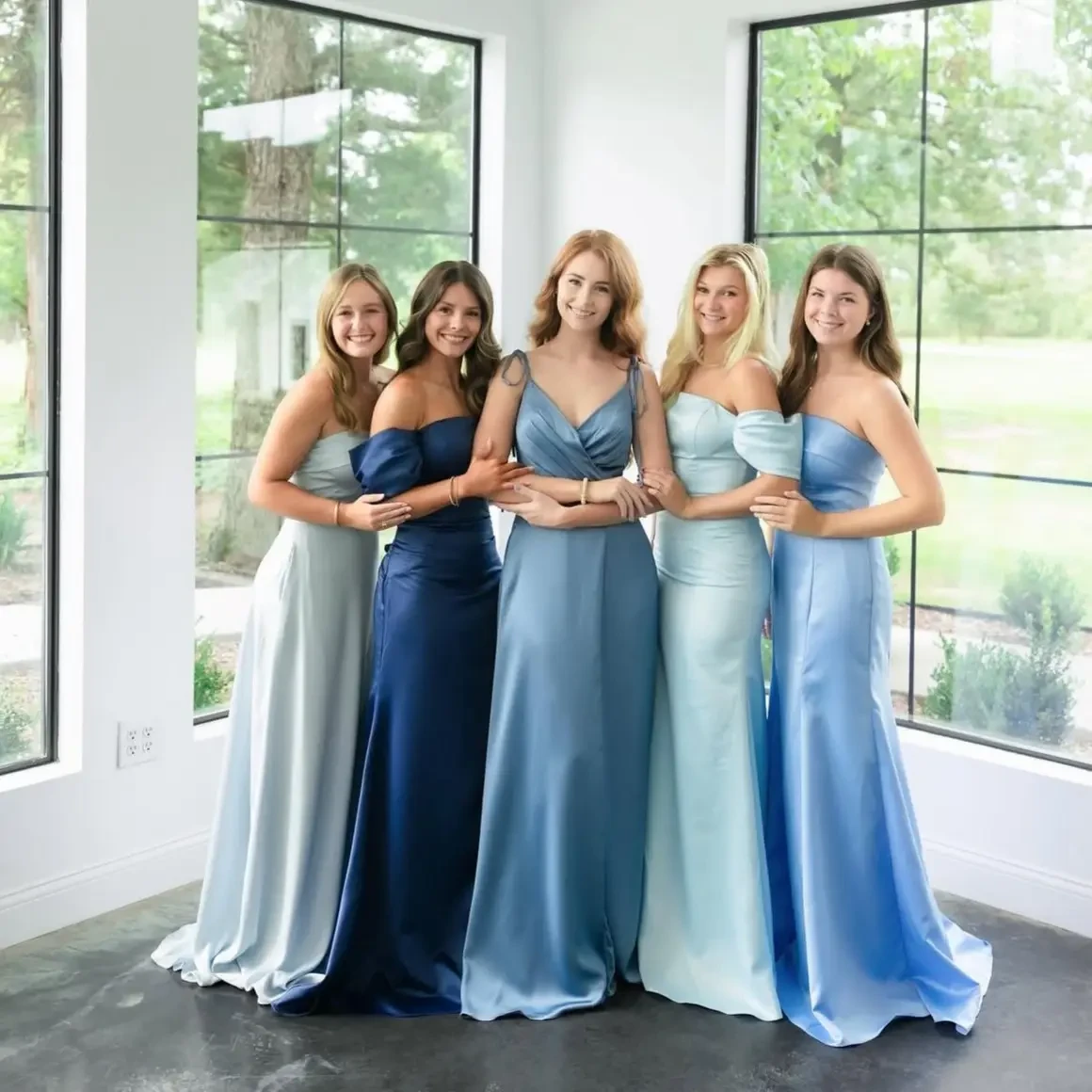 models wearing formal dresses blue
